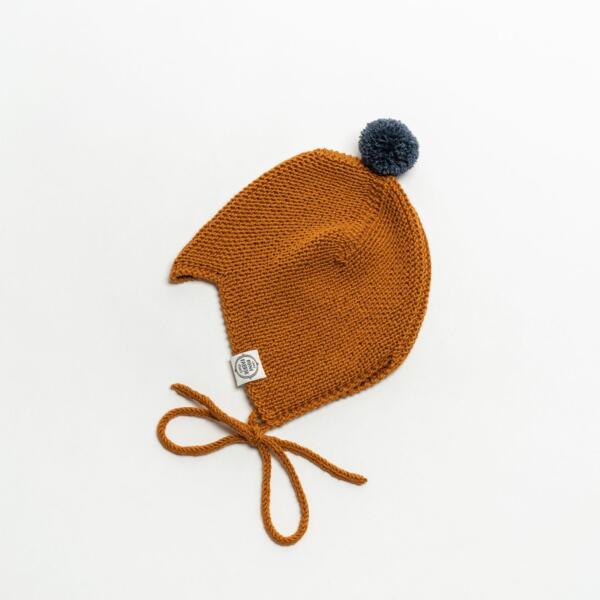 Mütze Baby Asta & August Merino Currygelb von Mini Fabrik